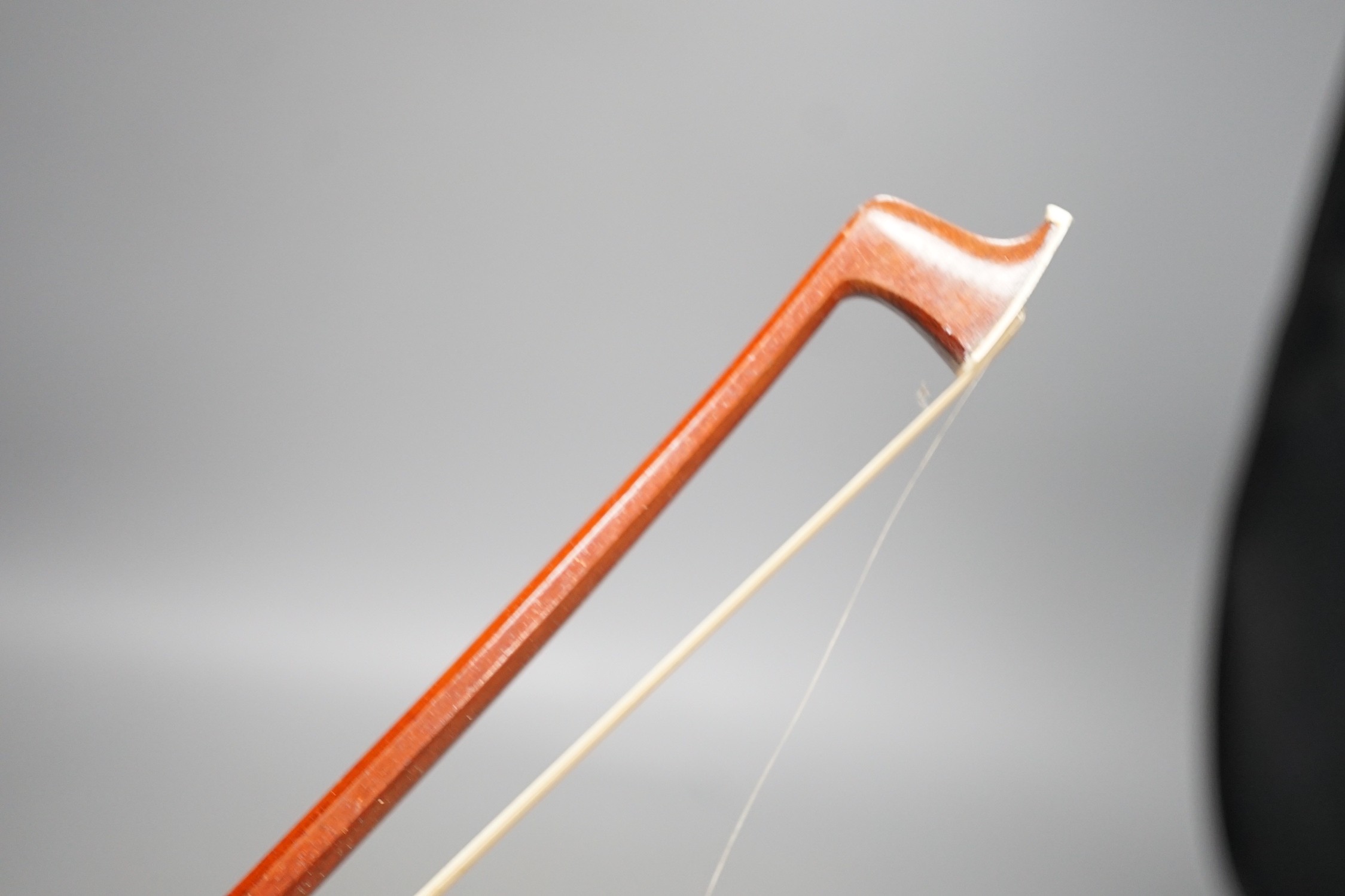 An R. Paesold, Germany violin bow with ivory veneered tip, 74cm